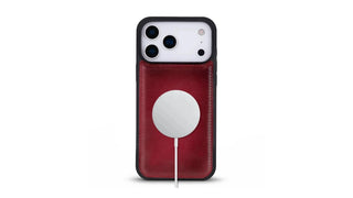 A picture of an iPhone 17 Pro with Blackbrook’s leather case attached to a MagSafe charger.