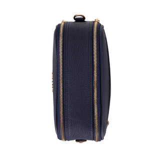 Navy blue leather bag with gold zipper on a white background