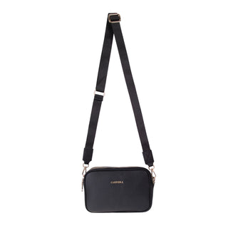 Black crossbody bag with a visible brand logo on a white background